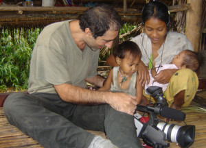 2014-2016 ISE Field Fellow Dario Novellino showing video to Marisa and her child, Palawan, 2004. Photograph provided by D. Novalino